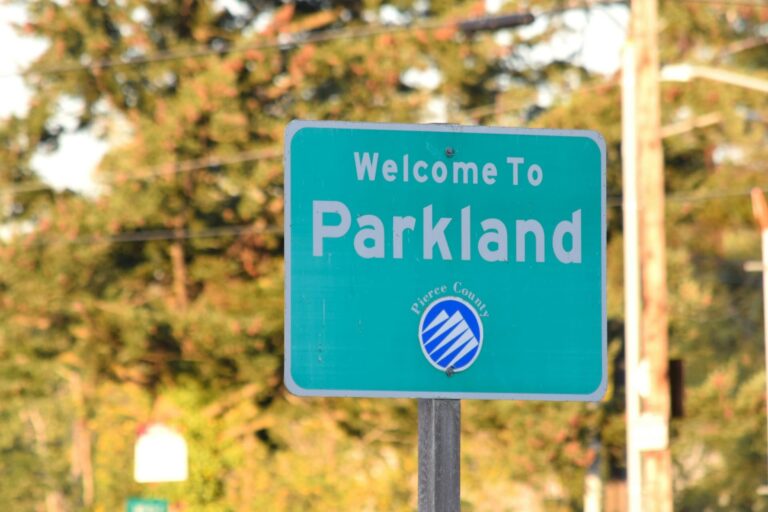 Trail sign in forest